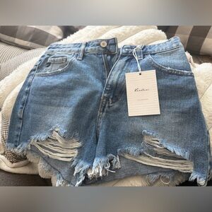 KanCan Women's Light Blue Distressed Denim Shorts